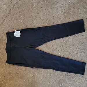 Elastic waist pants has a shimmer tint . Super cute